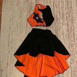 Black and orange sequin two piece dance costume